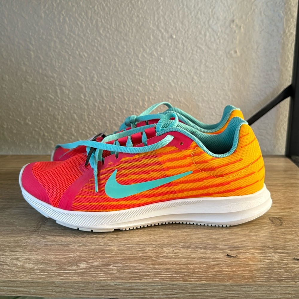 Nike running/athletic shoes. 6Y or 38.5 European. Size 8 adult women.